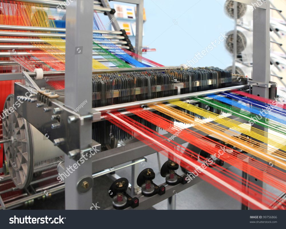 stock-photo-yarn-warping-machine-in-a-textile-weaving-factory-99756866