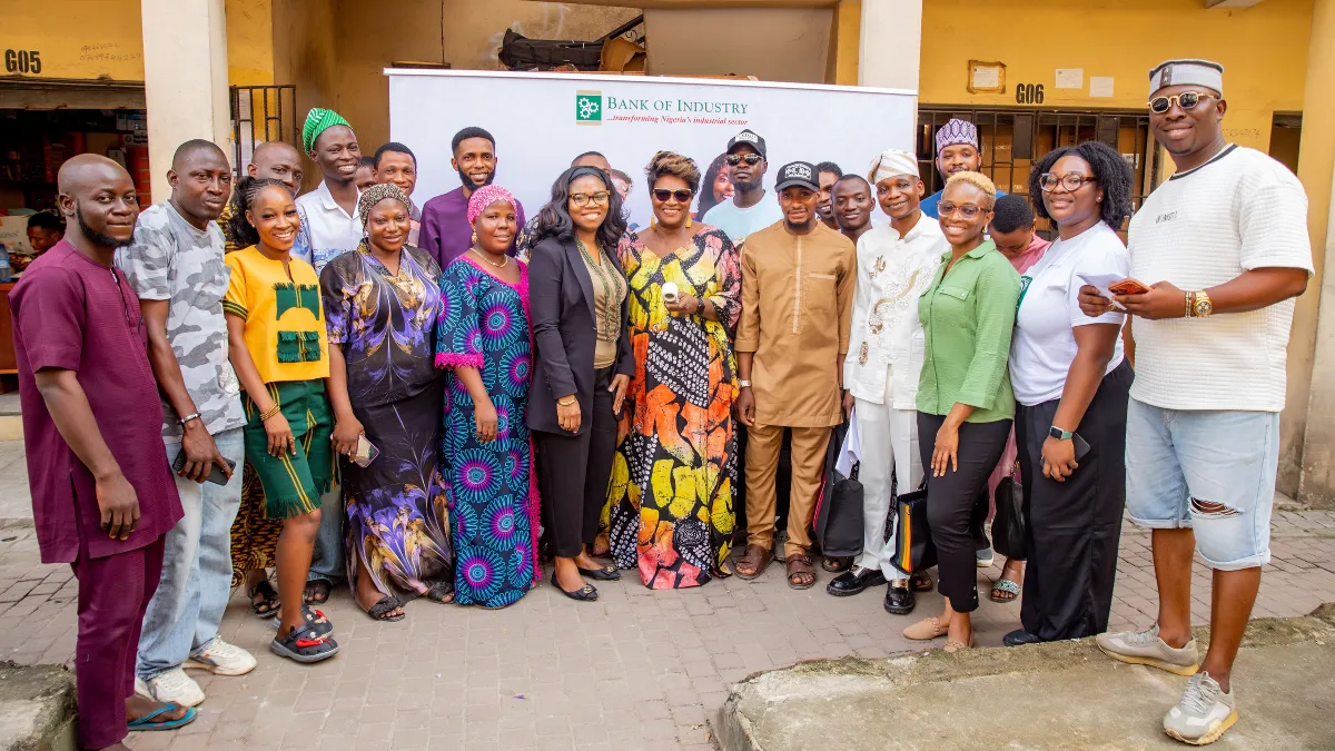 Describe what the photograph actually shows. If it shows the handover: “BOI solar power installation handover at a Lagos fashion hub.