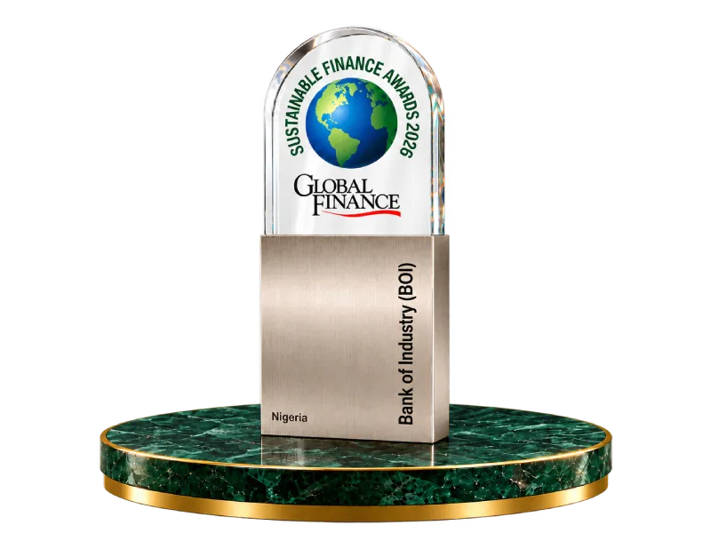 Bank of Industry’s Global Finance Sustainable Finance Awards 2026 trophy on a green-and-gold platform